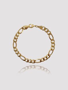 Inspired by all things of golden and vintage, this figaro chain design is a standout and unique piece from our collections. This bracelet makes a bold statement with simplicity of a chic and retro look. This jewelry piece will never tarnish and is resistant to water or sweat. Details: 18K Gold Filled (GF) Length 18.5cm (7") Width 8mm About 12g Hypoallergenic Classic Metal Bracelet With Chunky Chain, Classic Chunky Chain Metal Bracelets, Vintage Everyday Bracelet With Adjustable Chain, Vintage Everyday Bracelets With Adjustable Chain, Vintage Adjustable Chain Bracelets For Everyday, Vintage Gold Bracelet With Adjustable Chain, Vintage Gold Bracelets With Adjustable Chain, Elegant Metal Bracelets With Figaro Chain, Classic Gold Bracelet With Chunky Chain