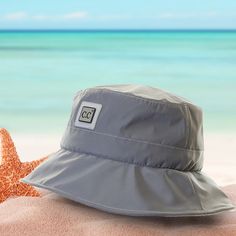 Looking for a hat that'll keep you dry, safe from the sun and looking amazing? Look no further than CC's Waterproof Reflective Bucket Hat! Stylish, lightweight and waterproof, this unisex hat will have you looking fly, no matter the activity or event. Plus, with adjustable inner band, a chin strap for secure fit and easy folding for travel, you'll be ready for anything! Don't forget, it's distributed by a family-owned USA business, and comes with Truly Contagious Support and CC branding & qualit Casual Waterproof Sun Hat For Travel, Waterproof Outdoor Bucket Hat, Waterproof Solid Color Bucket Hat For Outdoor, Waterproof Solid Bucket Hat For Outdoor Activities, Waterproof Solid Color Sun Hat For Outdoor, Waterproof Sun Hat For Outdoor, Waterproof Summer Travel Hats, Lightweight Waterproof Sun Hat For Travel, Lightweight Waterproof Travel Hat