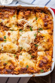 a casserole dish filled with meat and cheese