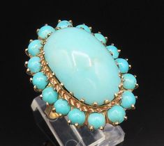 18K GOLD - Vintage Cabochon Turquoise Floral Cocktail Ring Sz 7.5 - GR539  Jewelry Type:          Ring  Metal Type:             18k Gold   Metal Size:              7.5 Finger  Stone Type:             Turquoise   Condition:               N/A  Jewelry Weight:      10.5 Grams  PLEASE NOTE: THIS ITEM IS PRE-OWNED. ALTHOUGH MOST ITEMS ARE IN VERY GOOD CONDITION, SOME MAY NEED CLEANING AND/OR MINOR REPAIRS. WE MAKE A VERY STRONG EFFORT TO UPLOAD CLEAR PICTURES. PLEASE INSPECT ALL PICTURES AND ASK ALL Floral Cocktails, Ring Metal, I Love Jewelry, Cluster Earrings, Cocktail Ring, Turquoise Jewelry, Cocktail Rings, White Gold Rings, Favorite Jewelry