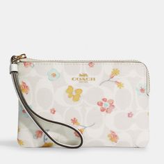 Signature Coated Canvas And Smooth Leather Two Credit Card Slots Zip-Top Closure, Fabric Lining Wrist Strap Attached 6 1/4" (L) X 4" (H) X 1/2" (W) Style No. C8702 Elegant Spring Wristlet, Elegant Spring Wristlet For Everyday, Elegant Rectangular Wristlet For Spring, Elegant Rectangular Spring Wristlet, Elegant Spring Rectangular Wristlet, Elegant Multicolor Wristlet For Everyday Use, Elegant Clutch Wallet For Spring, Elegant Spring Clutch Wallet, White Zipper Pouch