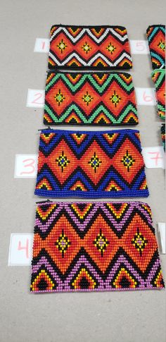 three rows of beaded placemats with numbers in the middle and one row on each side