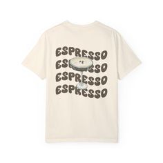 Finally! A T-shirt with the tastiest cocktail on it. This Comfort Colors T-shirt is perfect for anyone who loves espresso martinis! With a small martini on the front and the big graphics on the back, it is perfect to dress up or down with leggings or jeans.  This design is placed on a Comfort Color Heavyweight T-Shirt. Coffee Color Short Sleeve T-shirt With Screen Print, Coffee-colored Short Sleeve T-shirt With Screen Print, Coffee Graphic Tee With Crew Neck, Coffee Short Sleeve T-shirt With Screen Print, Coffee Crew Neck Graphic T-shirt, Coffee Color Graphic Tee With Crew Neck, Coffee Colored Short Sleeve T-shirt With Screen Print, Coffee Relaxed Fit Graphic Tee, Coffee Color Crew Neck Graphic Tee