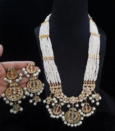 Most eligible gift for someone you love and someone very special for you. Best gift for your anniversary. Best gift for her Birthday. Necklace : 1 Earrings : 1pair. White Jewelry For Diwali Festival, Gold Kundan Necklace For Anniversary, Handmade, Temple Jewelry Sets As Eid Gifts, White Hand-set Temple Jewelry Sets, Cutdana Jewelry Sets For Celebrations, Temple Jewelry Sets For Eid Gift, Kundan Necklaces For Eid Gifts, Kundan Necklace With Tilla For Anniversary And Festivals, Temple Style Jewelry Sets For Eid Gifts