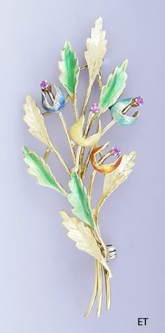 Presented is a beautiful 18 karat gold, ruby and multi-colored enamel pin or brooch. This is an Italian piece, dating to around the 1960s-1970s. The pin is done in the form of a bouquet of flowers, maybe tulips. There are four flowers, each with a different color enamel: blue, green, yellow, and orange. Emerging from each flower is a little ruby-tipped stem. The leaves of the flowers are alternatingly done in green enamel or bare gold with a textured, veined design. The pin has a rollover style A Bouquet Of Flowers, Retro Costume, Bouquet Of Flowers, Green Enamel, Pin Brooch, Enamel Pin, Flowers Bouquet, Brooch Pin, Tulips