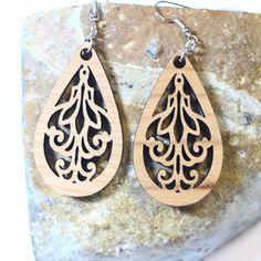 Laser cut intricate teardrop wood earrings. Gorgeous teardrop wood dangle earrings, laser cut from 3mm cherry wood. I love the intricate design of these earrings. These earrings complement both business and casual outfits and would make a great gift for her. Earrings measured 2 inches long and 1 inch wide, not counting the hooks. Can be made into clip on earrings. Earrings will be placed in a gift box, carefully packed and shipped, perfect as a gift for yourself or a loved one. Any questions? Pl Wooden Teardrop Earrings As Gift, Wooden Teardrop Earrings For Gift, Teardrop Wooden Earrings For Gifts, Teardrop Wood Earrings For Gifts, Teardrop Wood Jewelry Gift, Diy Earrings Tutorial, Wooden Bead Earrings, Laser Cut Earrings Acrylics, Laser Cut Wood Earrings