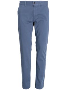 blue stretch-cotton belt loops two diagonal pockets to the sides two rear welt pockets concealed fly and button fastening slim cut Slim Fit Denim Blue Pants With Tapered Leg, Classic Mid-rise Chinos With Five Pockets, Mid-rise Blue Chinos For Work, Casual Slim Fit Blue Chinos, Blue Slim Fit Jeans For Business Casual, Classic Mid-rise Chinos For Business Casual, Modern Blue Pants With Belt Loops, Modern Blue Bottoms With Five Pockets, Business Casual Denim Blue Pants