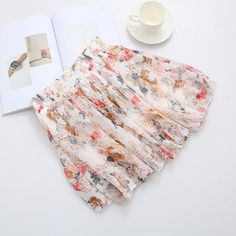 This floral chiffon skirt is absolutely perfect. Featuring an elastic waist, and a flowing skirt that falls mid-thigh this skirt is sure to be a new fave in your Summer & Spring wardrobes. Comes in five fabulous floral prints and made with a polyester & chiffon blend; this skirt pairs perfectly with wedges, heels or sandals. Floral Chiffon Skirt, Wedges Heels, Chiffon Floral, Nice Clothes, Flowing Skirt, Chiffon Skirt, Spring Wardrobe, Floral Chiffon, Rose Bouquet