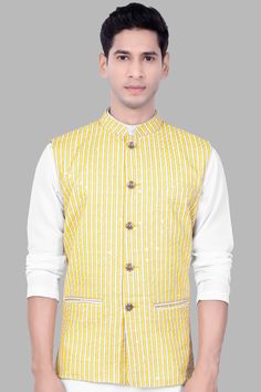 Elevate your festive ensemble with our Drover Yellow and Bright White Striped Designer Thread Embroidered Nehru Jacket. Perfect for weddings, engagements, or parties, this exquisite piece seamlessly blends style and comfort. Crafted for casual wear, it pairs flawlessly with a Kurta Jacket Set, offering a refined look for any occasion. Embrace sophistication with this Nehru Jacket for men, adorned with intricate thread embroidery, making it a timeless addition to your wardrobe. In addition to bei Cotton Bandhgala With Resham Embroidery For Wedding, Cotton Bandhgala With Zari Work For Wedding, Wedding Cotton Bandhgala With Resham Embroidery, Wedding Cotton Bandhgala With Zari Work, Wedding Cotton Bandhgala With Gota Work, Embroidered Cotton Nehru Jacket For Formal Occasions, Formal Embroidered Cotton Nehru Jacket, Elegant Nehru Jacket With Gota Work For Festive Occasions, Elegant Designer Cotton Nehru Jacket