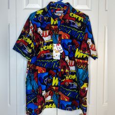 Oh Snap By Drill Clothing Shirt Men Short Sleeve Button Comic Book Super Hero L No Holes Or Stains Pit To Pit 23 Inches Across Length Measured In The Back From The Neck Hem Down 29 Inches Oo10 Casual Multicolor Character Print Shirt, Multicolor Cotton Shirt With Cartoon Print, Multicolor Cartoon Print Cotton Shirt, Fun Printed Blue Shirt, Fun Blue Printed Shirt, Retro Short Sleeve Shirt With Character Print, Pop Culture Summer Shirt With Character Print, Retro Cotton Shirt With Character Print, Pop Culture Character Print Shirt For Summer