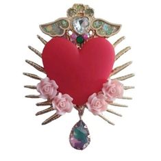 Ex-voto boho chic red heart brooch "Vibrant Red Heart Brooch" Add a touch of color and elegance to your outfit with this beautiful red heart brooch. Featuring a bright red heart at its center, this handmade accessory is adorned with delicate pink roses and gold accents, giving it a sophisticated and charming look. The brooch is topped with a sparkling heart-shaped crystal and sparkling angel wings, symbolizing protection and love. Suspended from the heart is a stunning drop-shaped crystal, addin Unique Heart-shaped Jewelry Brooch, Red Brooches For Valentine's Day, Heart-shaped Valentine's Day Party Brooches, Red Brooch For Valentine's Day Party, Pink Brooch For Valentine's Day Gift, Pink Brooches For Valentine's Day Gift, Heart-shaped Brooches For Valentine's Day Gift, Heart-shaped Brooch For Valentine's Day Gift, Red Valentine's Day Brooch