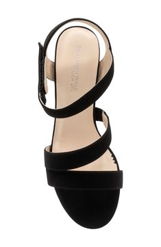 A strappy upper adds party-ready allure to an elegant sandal set on a cushioned footbed and wrapped block heel. 2 3/4" heel Adjustable ankle strap with hook-and-loop closure Cushioned footbed Synthetic upper, lining and sole Imported Wedge Sandals With 4-inch Heel For Night Out, Block Heel Sandals With Heel Strap For Night Out, Adjustable High Heel Sandals For Formal Occasions, Elegant Wedge Sandals With Buckle Closure And Block Heel, Elegant Wedge Sandals With Buckle And Block Heel, Formal High Heel Adjustable Sandals, Evening Synthetic Wedge Sandals With Buckle Closure, Elegant Adjustable Ankle Strap Wedge Sandals, Night Out Sandals With Wrapped Block Heel