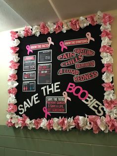 a blackboard with pink and white ribbons on it