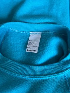 Classic blank solid blue long raglan sleeve crew neck pullover with ribbing on the hem, collar, and sleeve cuffs. In excellent vintage condition / no visible flaws. DETAILSMade in USAMaterial: 50% Creslan Acrylic Fiber, 50% Cotton SIZE & MEASUREMENTSTag Size: Small Length: 35"Bust: 32"Waist: 32"Sleeve: 24"Shoulder: 17" Blue Crew Neck Sweatshirt With Ribbed Cuffs, Basic Blue Crew Neck Sweatshirt, Basic Blue Sweatshirt With Ribbed Cuffs, Plain Stretch Crew Neck Sweater, Blue Crew Sweatshirt With Ribbed Collar, Blue Relaxed Fit Sweatshirt With Raglan Sleeves, Blue Stretch Long Sleeve Sweatshirt, Blue Crew Neck Sweater With Ribbed Cuffs, Blue Cotton Raglan Sleeve Sweatshirt