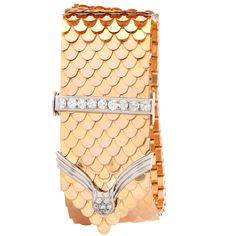 1940's Retro Diamond Buckle Bracelet featuring an intricate and flexible scale design which flows like silk and 16 diamonds with an estimated total weight of 1.5 carats. Metal Type: 18 Karat Yellow Gold Metal Weight: 136.1 Grams Bracelet Length: 9.5 inches Width: 1.25 inches. Gold Outfits For Women, Gold Outfits, Pink Gold Bracelet, Textured Bracelet, Sparkly Bracelets, Retro Bracelet, Lotus Jewelry, Vintage Bangles, Buckle Bracelet