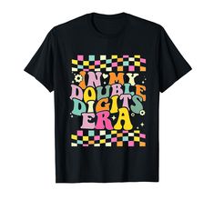 a black t - shirt with the words don't worry, do it's era