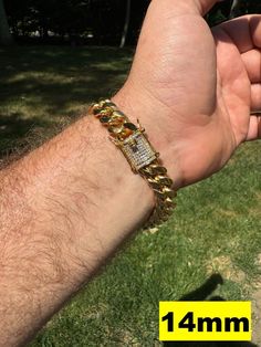 Gorgeous 18k yellow gold plated mens or ladies Cuban Link bracelets

 
Real 18k gold 5x electroplated over stainless steel
 
100% NICKEL & BRASS FREE so it will never turn your hand green!
Most people wear this chain for MANY YEARS without it changing color.
 
We have 8-14mm in thickness (Ranging from 25-100 grams depending on thickness & length)
VERY HEAVY & SOLID FEELS JUST LIKE GOLD!
Here is weight in 8" (if your bracelet is longer or shorter weight will vary)
8mm - 28 grams
10mm- 44 grams
12mm- 62 grams
14mm- 80 grams

Stand out from the crowd with a 1ct CZ clasp that is unique & ICY!

Handset 100 micropave CZ that look just like the real thing!!!
 
 
Each piece is stamped with 18k GP
 
YOU ARE GUARANTEED TO Gold Iced Out Tennis Bracelet, Luxury Gold Cuban Link Tennis Bracelet, Gold Iced Out Round Tennis Bracelet, Gold Iced Out Tennis Bracelet For Anniversary, Yellow Gold Cuban Link Tennis Bracelet With Cubic Zirconia, Cuban Link Yellow Gold Tennis Bracelet With Cubic Zirconia, Gold Diamond Cuban Link Bracelet With Vvs Clarity, Cuban Link Gold Tennis Bracelet Gift, Gold Cuban Link Tennis Bracelet As Gift