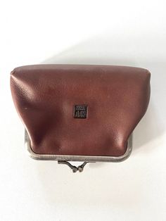 money pouch GFF coin purse  vintage GIANFRANCO FERRE small dark brown leather accessory with silver tone metal clasp logo lining and 2 compartment interior in overall very good condition considering likely age bags of designer chic from this well-known luxury brand - sourced in the South of France - a larger than average coin purse / money pouch in a dark brown soft, untextured leather finish with silver tone metal clasp which works well the interior is lined with GFF logo fabric and there is al Brown Formal Coin Purse With Coin Pocket, Classic Brown Coin Purse For Formal Occasions, Formal Brown Coin Purse With Coin Pocket, Classic Brown Rectangular Coin Purse, Classic Brown Coin Purse, Brown Rectangular Coin Purse With Snap Closure, Vintage Brown Pouch Coin Purse, Compact Brown Leather Coin Purse, Retro Brown Coin Purse For Gift