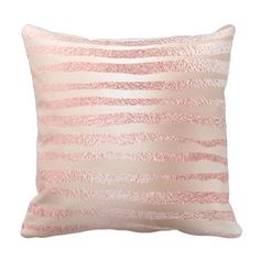 a pink and white striped pillow on a white background with the words rose gold blvd