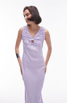 Look gorgeous at brunch in this lilac midi dress cut from lightweight cotton and topped with a keyhole cutout at the neckline. Slips on over head V-neck Sleeveless 100% cotton Machine wash, line dry Imported Lilac Midi Dress, Cotton Midi Dress, Long Sleeve Floral Dress, Satin Slip Dress, Maxi Dress Trend, Swimwear Sale, Key Hole, Dress Cuts, Hoodies For Sale