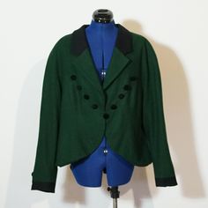 Georgeous jacket made of green colored wool. The jacket is used but in very good condition. The size is app. 46/L Measurements: Chest: 120cm Waist: 112cm Length: 61cm Sleeve length: 60cm Wool Long Sleeve Outerwear For Costumes, Classic Green Wool Coat With Long Sleeves, Retro Green Formal Outerwear, Classic Green Wool Coat, Fitted Wool Outerwear For Costumes, Fitted Green Wool Coat, Green Long Sleeve Tweed Jacket For Winter, Green Fall Costume Outerwear, Green Wool Long Sleeve Blazer