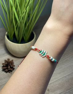 TITLE: Christmas Tree Bracelet, Pine Tree Bracelet, Christmas Bracelet, Adjustable Wish Bracelet, Secret Santa Gift,Christmas Gift,Holiday Bracelet W I S H   B R A C E L E T Close your eyes and make a wish, put this bracelet on your wrist. When the bracelet breaks in two, then your wish may come true. Cute Christmas tree bracelet with adjustable cord and zinc alloy Christmas tree charm. It is perfect as Christmas gift. Adjustable sliding knot allows you to create a personalized fit.  Minimum length of the bracelet is 7.09 inches and the maximum is 11.02 inches. Holiday Bracelet, Holiday Bracelets, Christmas Tree Charm, Bracelet Christmas, Cute Christmas Tree, Secret Santa Gift, Christmas Bracelet, Wish Bracelets, Sliding Knot