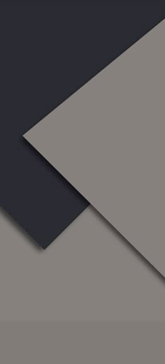 an abstract black and grey background with diagonal lines in the center, as well as two different shades of gray