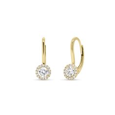 A total classic. Featuring round-brilliant cut diamonds illuminated by sparkling halos, these 18K gold lever back earrings are an essential for every woman’s jewelry box. - 18K gold weighing 2.19 grams - 32 round diamonds totaling 0.11 carats - 2 round diamonds totaling 0.46 carats Available in yellow, white, and rose gold. Please allow 4-6 weeks for delivery if item is not in stock. Item no. E04784 Yellow Gold Diamond Cluster Earrings With Halo, Formal Yellow Gold Cluster Earrings With Halo Setting, Formal Yellow Gold Cluster Earrings With Halo, Gold Diamond Earrings With Halo Setting For Formal Occasions, Classic 14k Gold Diamond Earrings With Halo Design, Fine Yellow Gold Diamond Earrings With Lever Back, Yellow Gold Diamond Earrings With Halo Setting, Yellow Gold Diamond Halo Drop Earrings, Elegant Diamond Earrings With Lever Back And Round Cut