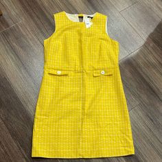 Nwt Brooks Brothers Dress. Fully Lined. Flaps In Front Do Not Have Pockets. Chic Yellow Shift Dress, Yellow Sheath Midi Dress For Work, Yellow Shift Midi Dress For Spring, Yellow Knee-length Midi Dress For Work, Yellow Lined Fitted Midi Dress, Yellow Lined Midi Dress, Yellow Fitted Lined Midi Dress, Yellow Shift Dress, Knee-length, Yellow A-line Mini Dress For Work