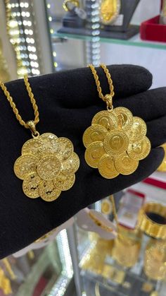 Our product is 22 carat gold plated,Our necklaces are designed with meticulous workmanship in our workshops by our jewelers.It is exactly the same as the real gold model and will never fade, These unique jewelry are designed to complete your combinations on your special days, You can contact us for all your questions about our flamboyant, unique 1st class jewelry. Our products are processed by masters and are a one-to-one jeweler model. Our 22 carat gold plated jewelry is no different from the r Luxury 22k Gold Ceremonial Jewelry, 22k Yellow Gold Medallion Jewelry, Plated Yellow Gold Pendant Chain Necklace, Exquisite Gold Necklace With Large Pendant, Gold Temple Jewelry Chain Necklace Gift, Yellow Gold Plated Pendant Jewelry, Gold Temple Jewelry Style Chain Necklace, Luxury Jewelry With Intricate Design And Round Pendant, Gold Plated Amulet Necklace