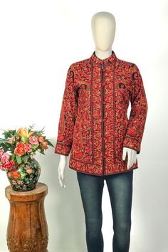 Add a touch of elegance to your wardrobe with this stunning Kashmiri Jamawar embroidered jacket. The intricate embroidery adds a pop of color and texture. Made from high-quality materials, this jacket is perfect for both formal and casual occasions. Product Details - Condition: Brand New (made to order) - Style: Jacket - Fabric: Pure Wool  - Embroidery: Kashmiri Jamawar Aari Embroidery - Fully Lined from Inside - Features Pocket on both sides - Base Color: Black - Embroidery Color: Multi-Colour Winter Nehru Jacket With Floral Embroidery, Traditional Fitted Outerwear With Embroidered Border, Fitted Traditional Outerwear With Embroidered Border, Fitted Stand Collar Outerwear With Intricate Embroidery, Fitted Winter Outerwear With Chikankari Embroidery, Festive Chikankari Embroidery Long Sleeve Outerwear, Festive Outerwear With Chikankari Embroidery, Festive Long Sleeve Outerwear With Chikankari Embroidery, Traditional Fitted Outerwear With Stand Collar