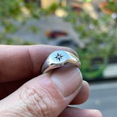 A classic small circle signet ring star-set with a 2mm black diamond. These timeless signet rings are meticulously crafted by hand in our Melbourne workshop, created out of wax and then cast into solid precious metal. Made with the highest quality Australian sterling silver to last forever. Made solid, not hollow like many others, all of our rings are hand-stamped with a Sterling Silver (925) hallmark and Custom Creed makers mark and come gift-wrapped in a branded box with satin black ribbon. Du White Gold Signet Ring Men, Stamp Ring, Edgy Accessories, Rustic Rings, Mens Rings Fashion, Signet Ring Men, Signet Rings, Silver Signet Ring, Small Circle