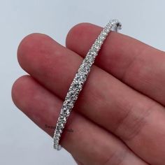 Moissanite Wedding Bangle, Round Colorless Diamond Half Eternity Band, Diamond Bangle For Women & Girl's, 18K Gold Bangle, Anniversary Gift ❁Description❁ Moissanite & Simulated Stone: ----------------------------- Stone Shape: Round Cut Stone Size: 4.50 mm, 4 mm, 3.50 mm Weight: 7.68 TCW Color: Colorless Cut: Excellent Clarity: VVS ❁ You Can be Planning to place your custom order, Then Do it by onwards. ↣ handmade moissanite made by craftsman with full of festinating and brilliance. As well Stone is produced with excellent cuts, grades and superior quality for our customers. ↣ Metal Preference: 925 Sterling Silver/10KT/14KT/18KT ↣ Metal Tones: Yellow Gold, White Gold, Rose Gold ❁ Stone types & choices: ↣ Natural Diamond, Lab-grown diamond, Precious and semi-precious gemstones ❁ Stone Shape 18k Gold Bangle, Diamond Half Eternity Band, Colorless Diamond, Half Eternity Band, Gold Bangle, Diamond Bangle, Eternity Band Diamond, Eternity Band, Precious Jewelry