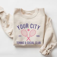 Custom Tennis Sweatshirt This custom tennis sweatshirt will be made just for you (and for teams too)! If you are looking for different colors or any other customizations, no problem! Please add the details in the personalization box below. I will create a proof and send it to you prior to sweatshirt production. Please put the following information in the personalization box below: 1. City/Club Name (top row) 2. Date 3. Other personalization  This is a Gildan Sweatshirt with a UNISEX FIT. Please review the size chart in the images before you place your order. If you have any questions about sizing, I would be happy to help! If you don't see the specific color that you are looking for, please message me and I will get back to you quickly. PRODUCTION and SHIPPING Production takes about 1-3 da Shirt Old Money, Tennis Club Sweatshirt, Tennis Sweatshirt, Club Name, Captain Gifts, Aesthetic Sweatshirt, Tennis Shirt, City Club, Gildan Sweatshirt