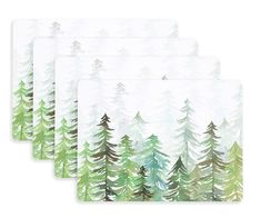 four placemats with trees on them in green and white colors, set of 4