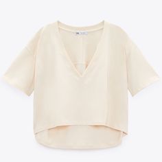 V-Neck T-Shirt With Short Sleeves. Asymmetric Hem. Ref 0264/352 #2 Beige V-neck Top For Summer, Solid V-neck Summer Top, Beige V-neck Crop Top For Spring, Beige V-neck Top By Zara, Zara Beige V-neck Top, Zara Beige V-neck Blouse, Trendy Zara V-neck Top, Zara V-neck Summer Blouse, Zara Trendy V-neck Crop Top