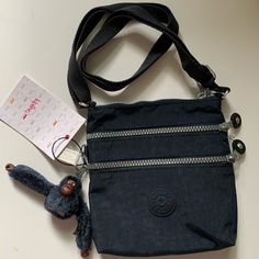 Size: 6.25” X 6.75” X 1.5” Model: Alvar Xs Brand New With All The Tags Attached. Ac7098 Color 414 Blue Shoulder Bag With Zipper Closure, Ideal As Gift, Blue Shoulder Bag With Zipper Closure As Gift, Blue Bag With Zipper Pocket For Gift, Blue Bag With Zipper Pocket As Gift, Kipling Crossbody Bag, Mini Monkey, Hip Pouch, Red Crossbody Bag, Kipling Bags