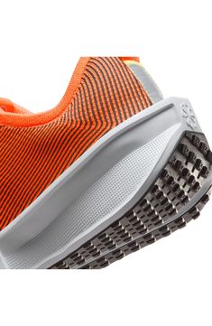 Aerodynamic overlays bring fresh, daring energy to a sneaker engineered to bring comfort and attention to every step. Textile and synthetic upper/textile lining/rubber sole Imported Nike Technical Running Shoes, Orange Mesh Running Shoes For Jogging, Functional Orange Mesh Sneakers, Nike Athleisure Running Shoes With Shock Absorption, Nike Running Shoes With Shock Absorption For Streetwear, Modern Orange Sneakers For Running, Orange Mesh Running Shoes For Sports, Functional Orange Running Shoes For Light Sports, Functional Orange Mesh Running Shoes