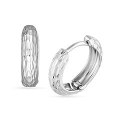 Add a touch of shine and shimmer to any look with these diamond-cut huggie hoop earrings. 14K white gold Each huggie hoop features an allover diamond-cut detailing that catches and reflects light 12.4 x 3.2mm Hinged backs Modern White Gold Diamond Cut Huggie Earrings, Minimalist Round Diamond Cut Huggie Earrings, Minimalist Diamond Cut Huggie Earrings, Minimalist Round Huggie Earrings With Diamond Cut, Silver Diamond Cut Huggie Jewelry, Modern Round Diamond-cut Huggie Earrings, Modern Round Diamond Cut Huggie Earrings, Silver Huggie Jewelry With Diamond Cut, White Gold Huggie Jewelry With Diamond Cut