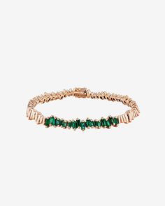 Discover the unique elegance of our Golden Sapphire ID Bracelet, a modern interpretation of a classic style. This bracelet combines the brilliance of 1.75 carats of emerald baguettes with 18K gold pieces, meticulously crafted to mimic the silhouettes of gemstones. Details 18k yellow gold or rose gold 1.75 carats of emerald baguettes Bracelet measures 7 inches in length Box clasp with safety lock fastening Embellishment measures 2 inches in length 6.35mm width Ref: AKB566 Formal Rose Gold Baguette Cut Bracelet, Elegant Emerald Diamond Bracelet For Formal Occasions, Elegant Formal Emerald Diamond Bracelet, Fine Jewelry Emerald Jubilee Bracelet, Elegant Diamond And Emerald Bracelet With 17 Jewels, Elegant Hand Set Emerald Bracelets, Elegant Yellow Gold Diamond And Emerald Bracelet, Elegant Yellow Gold Emerald Tennis Bracelet, Elegant Emerald Jubilee Bracelet