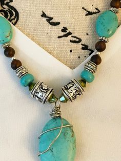 Brown Turquoise Necklace With Natural Stones, Spiritual Style, Artisan Brown Turquoise Necklace With Gemstone Beads, Earthy Turquoise Jewelry With Wooden Beads, Artisan Turquoise Necklace With Wooden Beads, Southwest Jewelry, Southwestern Jewelry, Turquoise Howlite, Wood Pendant, Over Sized