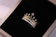 "14k Gold Princess Tiara Crown Ring / Yellow Gold CZ Princess Crown Ring FEATURES @ Made to Order @ Materials: 14K @ Avg Weight: 3.4g @ Gemstone: Cubic @ Setting Type: Prong @ Handmade in the USA SIZING If you need assistance with your ring size, just hit the \"Message CherVenue\" button and we will get back you within a few hours. RETURNS & EXCHANGES I gladly accept returns, exchanges, and cancellations Contact me within: 7 days of delivery Ship items back within: 14 days of delivery Request a Gold Ring Design For Women Crown, Queen Ring Design Gold, Queen Rings Princess Crowns, Wedding Rings Crown, Queen Ring Design, Crown Ring Queen, Crown Ring Design, Princess Ring Crown, Crown Gold Ring