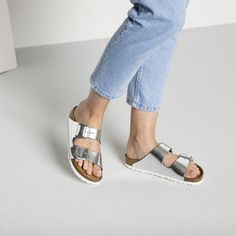 Arizona Natural Leather Metallic Silver Silver Round Toe Slides With Buckle Closure, Modern Silver Sandals With Buckle Closure, Silver Footbed Sandals With Removable Insole And Round Toe, Silver Open Toe Slides With Buckle Closure, Silver Open Toe Slides With Buckle, Casual Silver Leather Slides, Silver Slides With Removable Insole, Silver Open Toe Footbed Sandals With Buckle Closure, Silver Slides With Leather Footbed