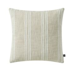 a white striped pillow on a white background