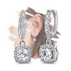 PRICES MAY VARY. ◆ This is a very classic women's sterling silver earring made of classic cubic zirconia loop earrings and pendant. The classic and elegant earrings can be more fashionable and suitable for most women. Classic fashion earrings can be matched with a variety of styles of clothing, whether casual or dress up! ◆ The silver hoop earrings are made of sterling silver and cubic zirconia. The high quality AAA+ cubic zirconia makes the earrings shine and dazzle. It makes the wearer more ey Elegant Silver Hoop Earrings As A Gift For Her, Gift Halo Design Crystal Earrings In Cubic Zirconia, Gift Crystal Earrings With Halo Design, Gift Halo Crystal Earrings With Cubic Zirconia, Elegant Hypoallergenic Hoop Earrings As Gift For Her, Hypoallergenic Round Hoop Earrings As A Gift For Her, Adjustable Cubic Zirconia Earrings For Party, White Gold Dangle Hoop Earrings For Gift, Adjustable Cubic Zirconia Party Earrings