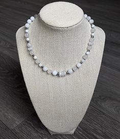 This beautiful choker was hand designed with all moonstone beads and faceted hematite spacers. The milky moonstone beads are rainbow moonstone in 8 and 6 mm rounds, and the clearer more flashy beads with the most gorgeous blue flash are the high grade moonstone beads. These include rounds and faceted rondelles.  Secured with a lobster clasp, This necklace is 16 inches and length and extendable to 19 inches to fit most everyone.  Moonstone is the perfect stone for June babies and Geminis. Moonstone is also an amazing gem for getting in tune with our creative, intuitive feminine energies. The tranquil energy of moonstone invites creativity and restoration, easing negative emotions and tensions in everyday life. I personally chose to wear moonstone daily with my other jewelry :) Moonstone Choker, Dagger Necklace, Beautiful Chokers, Bracelets Design, Beads Bracelet Design, Moonstone Beads, Moonstone Necklace, Cute Necklace, Minimalist Necklace