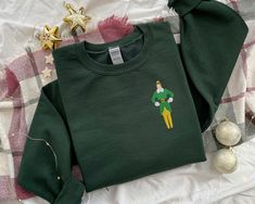 Elf Sweatshirt, Movie Tattoo, Elf T Shirt, Elf Movie, Buddy The Elf, Christmas Crewneck, Elf Christmas, Jolly Christmas, Embroidered Crewneck