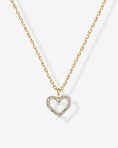 Unlock love. The pretty PAVOI 14K gold-plated necklace with a trend-right open heart pendant takes any outfit to the next level. A gorgeous and elegant piece, this cute necklace makes an excellent love necklace, friendship necklace, or gift to yourself. AAAAA Cubic ZirconiaMeasurements: Heart pendant: 9mm(.35") x 10(.4").Chain Length: 18"+ slider adjustable chain.Stone sizes: 1.2mm Luxury Dainty Rose Gold Heart Necklace, Trendy Heart Pendant Necklace For Anniversary, Trendy Necklace For Anniversary On Valentine's Day, Trendy Rose Gold Heart Necklace, Trendy Necklaces For Valentine's Day Anniversary, Trendy Anniversary Necklaces For Valentine's Day, Trendy Anniversary Necklace For Valentine's Day, Trendy Heart Charm Necklace For Anniversary, Trendy Rose Gold Heart Charm Necklaces