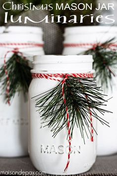 mason jars decorated with pine needles and twine are the perfect christmas decoration for your home