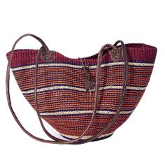 PRICES MAY VARY. Please note that given the unique handcrafted nature of each basket, there are no two alike. Colors and patterns will vary. Measurements may vary slightly. Fair-Trade handwoven bag, ethically sourced from our cooperatives in West Africa. Each basket is completely unique and the leather tag inside is personally signed by the weaver. Made with wild-harvested Savannah grass and leather wrapped handles and straps. Care and Use: To reshape your basket, spray lightly with water, shape Woven Leather Bucket Shoulder Bag, Traditional Natural Woven Leather Shoulder Bag, Daily Use Woven Bucket Shoulder Bag, Woven Bucket Shoulder Bag For Daily Use, Woven Natural Fiber Bucket Shoulder Bag, Woven Natural Fiber Basket Bags, Everyday Woven Basket Bucket Bag, Handwoven Basket Shoulder Bag For Daily Use, Bohemian Woven Bucket Shape Shoulder Bag